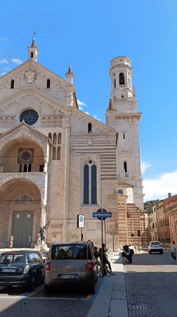 Exploring a Romanesque church's exterior in central Verona