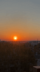Evening sunset and sleeping corgi captured in Chaikovsky, Russia