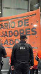 Workers, retirees protest in Buenos Aires with labor banners