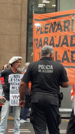 Workers, retirees protest in Buenos Aires with labor banners