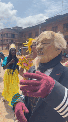 Masked procession winds through the streets of Porto-Novo