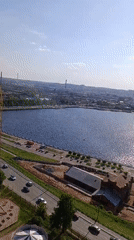 Visitors enjoy amusement park rides and attractions in Izhevsk