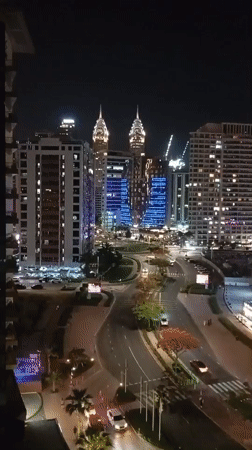 Dubai nighttime cityscape and highway traffic captured Sunday evening