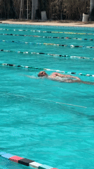 Solo swimmer does laps in Nha Trang pool