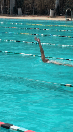 Solo swimmer does laps in Nha Trang pool