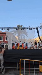 Live music and dance on an outdoor stage in Dénia