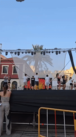 Live music and dance on an outdoor stage in Dénia