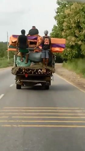 Loaded truck carries mixed cargo through Nkpor, Nigeria