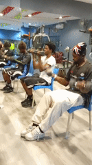 Seated dumbbell curls in progress at the gym