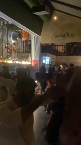 Busy evening crowd dances at WatsOons bar in Chennai