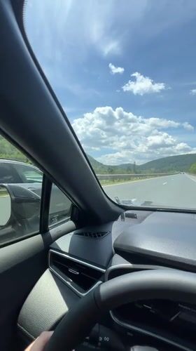 Highway drive through rural Bulgaria, dashboard nav in view