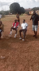 Pickup football on a dirt pitch in Jos, Nigeria