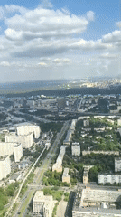 Tourists visit Moscow's Ostankino Tower observation deck, take selfies