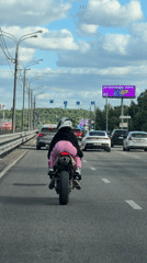 Two riders spotted on motorcycle in Dolgoprudny traffic