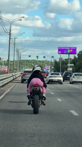 Two riders spotted on motorcycle in Dolgoprudny traffic