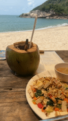 Beachside dining captured at Thai coastal restaurant