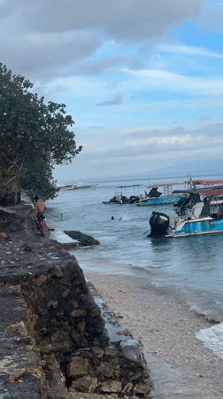 Tourist captures coastal leisure moments at Nusa Penida, Indonesia