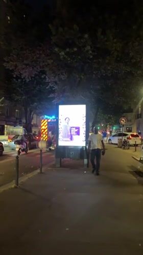 Young adults celebrate on Paris streets, emergency response observed