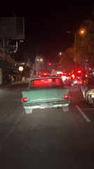 Vintage green Honda spotted driving through Denpasar streets