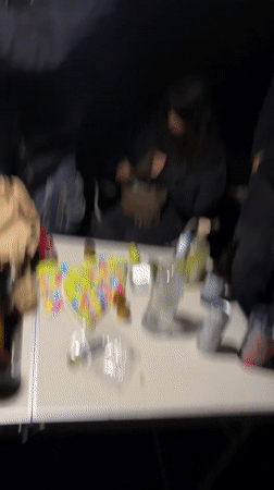 Young people gather for outdoor drinks in Auvers-Saint-Georges