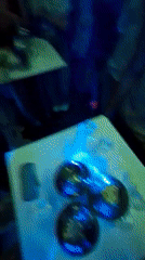 Nightclub scene captured in Sofia with crowds socializing, dancing