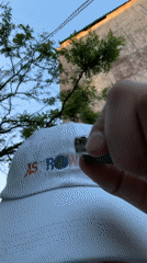 Person documents burning ASTROWORLD cap, city scenes in Yerevan