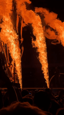 Stadium concert in Nice with elaborate golden sculpture and pyrotechnics