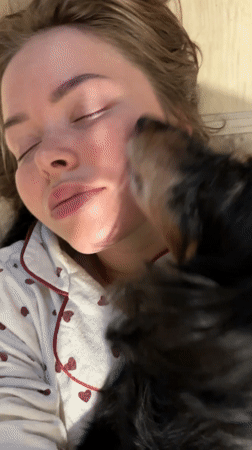 Woman takes late-night selfie with curious dog in Izhevsk