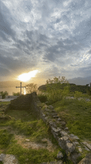 Christian cross monument filmed at sunset in Tivat, Montenegro