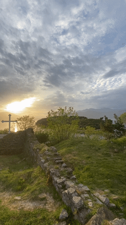 Christian cross monument filmed at sunset in Tivat, Montenegro