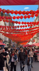 Red Chinese lanterns decorate busy London street