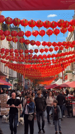 Red Chinese lanterns decorate busy London street