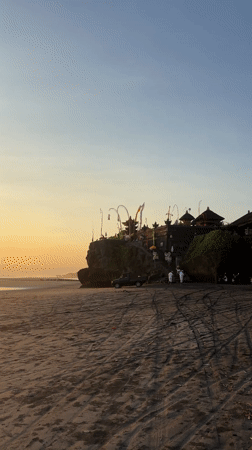 Morning scenes documented across Balinese temples, beaches and waterfalls