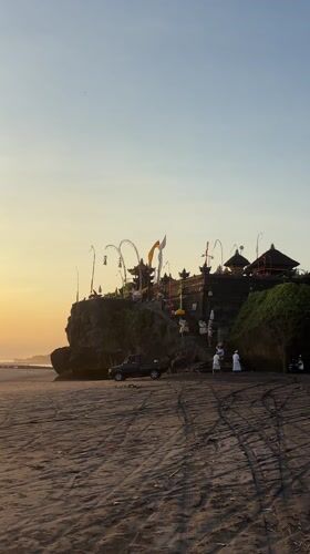 Morning scenes documented across Balinese temples, beaches and waterfalls