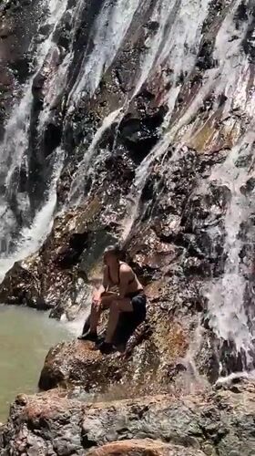 Morning swim at Baan Thurian waterfall with shrine