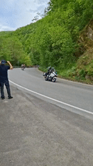 Cycling race winds through mountain roads near Kokalyane, Bulgaria