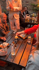 Evening social gathering at London pub garden captured