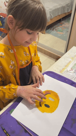Child creates Victory Day artwork in Rusanovo, Russia