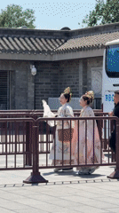 Traditional-dressed women, uniformed children observed in Beijing's Dongcheng District