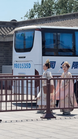 Traditional-dressed women, uniformed children observed in Beijing's Dongcheng District