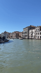 Morning canal activity documented in Venice's Grand Canal