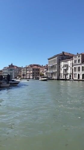 Morning canal activity documented in Venice's Grand Canal