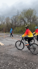 Cyclists navigate obstacle course during early morning training in Orenburg