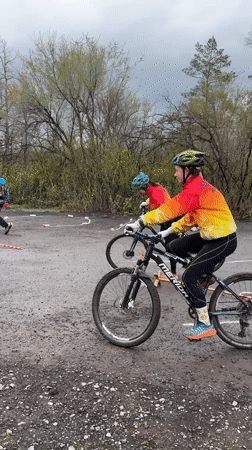 Cyclists navigate obstacle course during early morning training in Orenburg