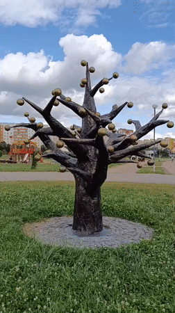 Afternoon stroll through a Zhlobin park full of sculptures