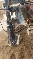 Man operates concrete block machine in Markurdi Nigeria