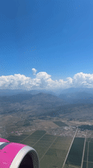 Passenger documents Montenegro landscape during morning flight over Krupice region