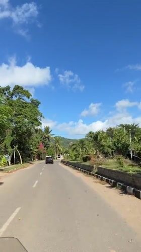 Dashboard camera captures nighttime drive through Kuta, Indonesia