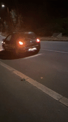 Roadside vehicle breakdown and jack work at night