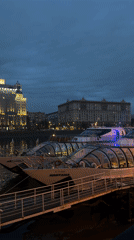 Moscow's Radisson Collection hotel captured in nighttime riverfront footage
